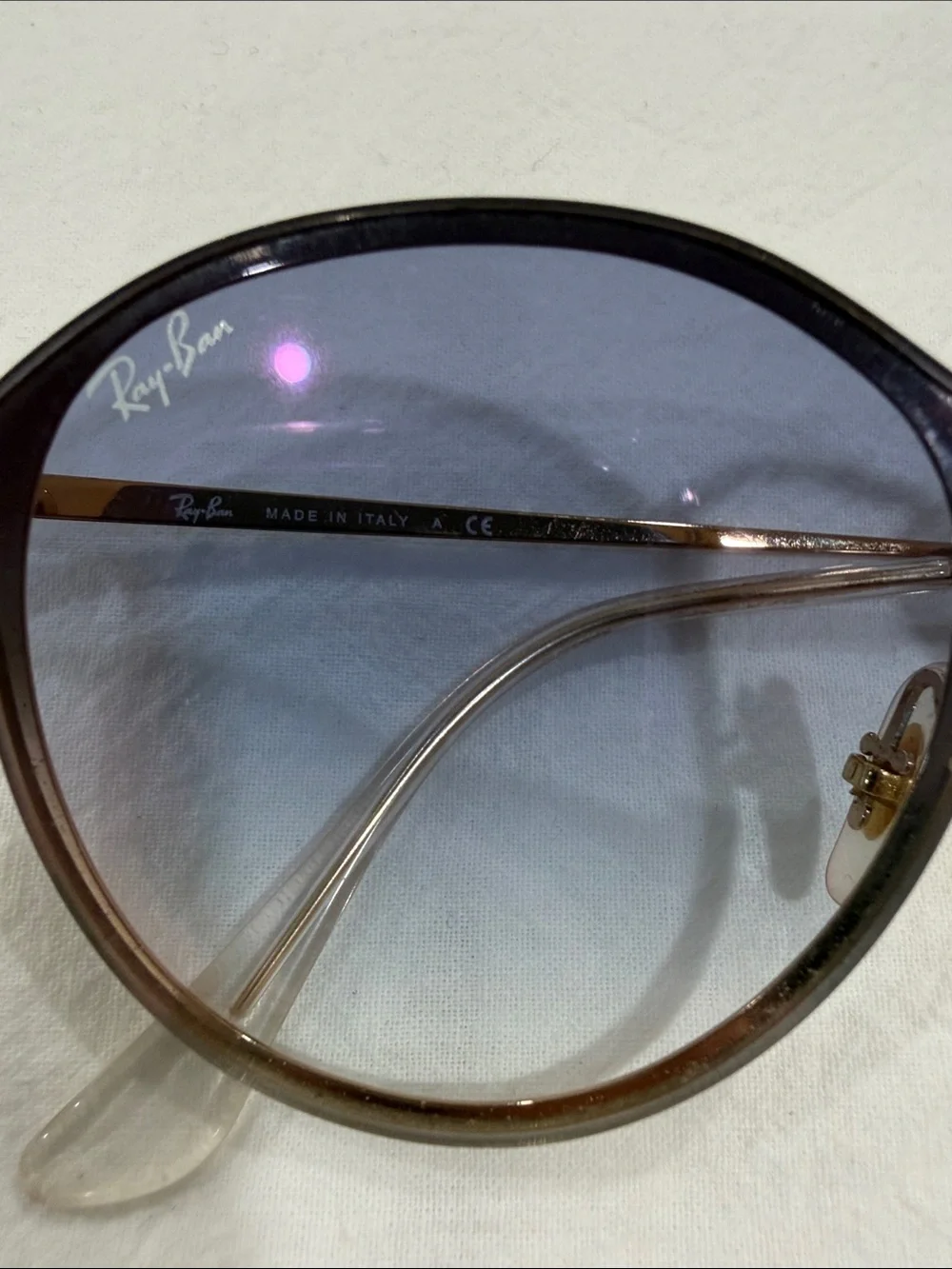 Ray-Ban gold hidden Frame Sunglasses with Blue Lenses
